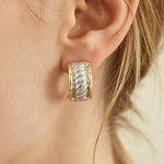 Load image into Gallery viewer, Two Toned Cubic Zirconia Twisted Hoop Earrings
