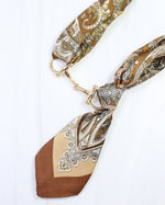 Load image into Gallery viewer, Lana Horsebit Scarf Necklace Brown
